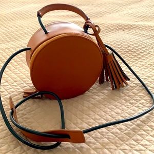 Brown round leather purse